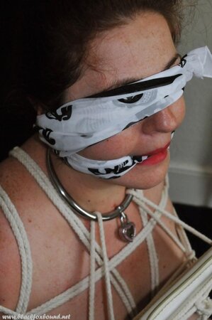 Chubby redhead is naked and tied up to chair by her dominant husband