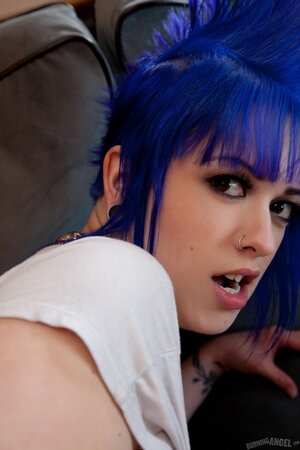 Teen punk girl with a blue mohawk makes it with small vibrator and guy's cock