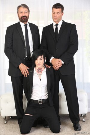 Businessmen double penetrate one of their splendid brunette assistants