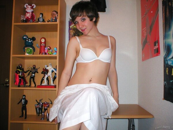 Movie fan with sincere eyes gets naked and plays with toys on her own
