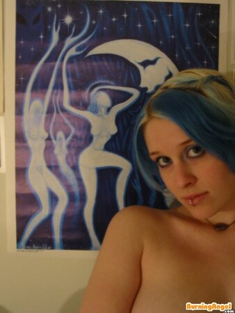Babe with colorful hair doesn't feel shy to flash her smooth pussy