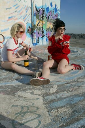 Slinky brunette and blonde have picnic outdoors that turns into a lesbian affair
