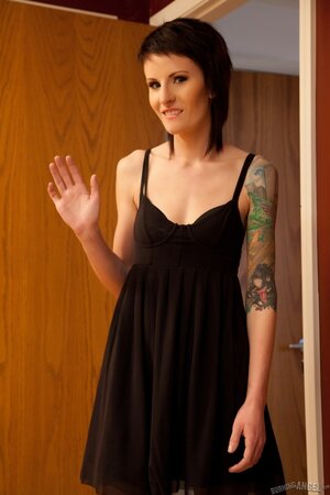 Skinny chick with a tattoo on her shoulder fools around and gets cum on flat chest