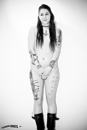 Girl with tattoos believes that she has a hot body and it's hard to argue