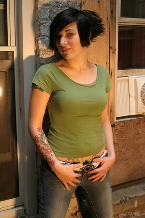 Alt girl with fancy haircut and pierced nipples doesn't feel shy showing body off