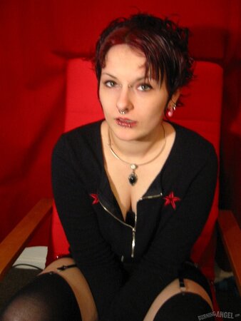 Good-looking coed with red hair likes piercing and pussy masturbation
