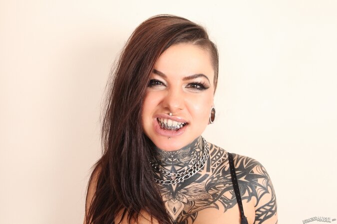 Chick with shaved temple and tattoos wants to differ from other whores