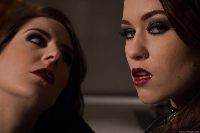 Biker babes in black leather jackets play their own lesbian games in the garage