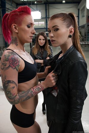 Experienced lesbian with her sexy girlfriends make love on a sex swing