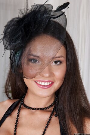 Stunning teen makes a great show of her slender body in black lingerie