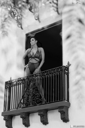 Waking up Dylan Ryder goes to the balcony to show her underwear to guys down there