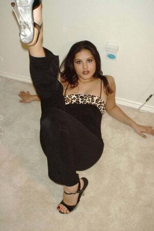 Indian girl in heels exposing her firm breasts and excellent body on the floor