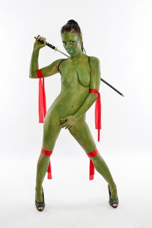 Girl is going to be a Ninja Turtle so she practices some moves in the nude