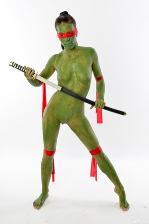 Girl is going to be a Ninja Turtle so she practices some moves in the nude