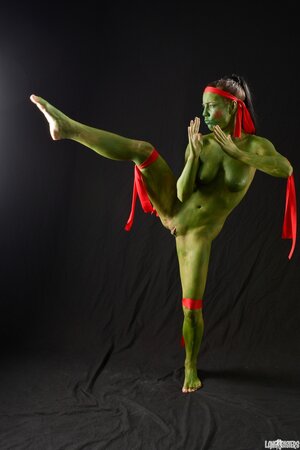 Girl is going to be a Ninja Turtle so she practices some moves in the nude