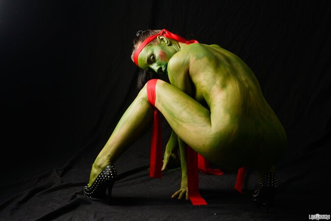Girl is going to be a Ninja Turtle so she practices some moves in the nude
