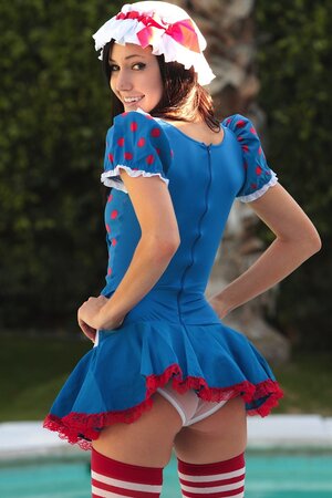 Cosplay chick makes outdoor photo shoot hotter by peeling off panties