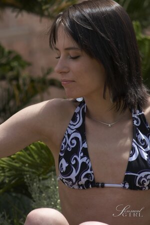 Skinny girl with small tits prefers to sunbathe naked in the fresh air