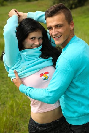 Black-haired cutie facialized after outdoor sex with BF in the field