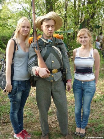 Blonde girl thinks about sex even when she is at the exhibition of wax figures