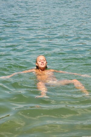 Young chick with tan lines doesn't know that boyfriend secretly takes pics of her