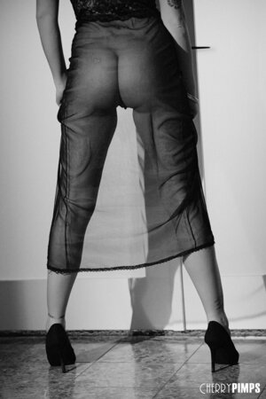 Black and white pictures of the girl with juicy melons masturbating hairy pussy