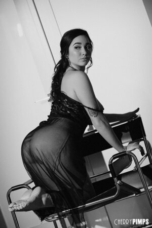Black and white pictures of the girl with juicy melons masturbating hairy pussy