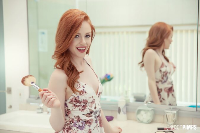 Pale British redhead climbs the bathroom countertop for pussy fingering