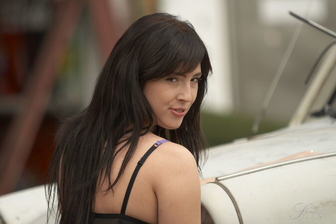 Vintage cars turn the brunette on so much that she undresses by them