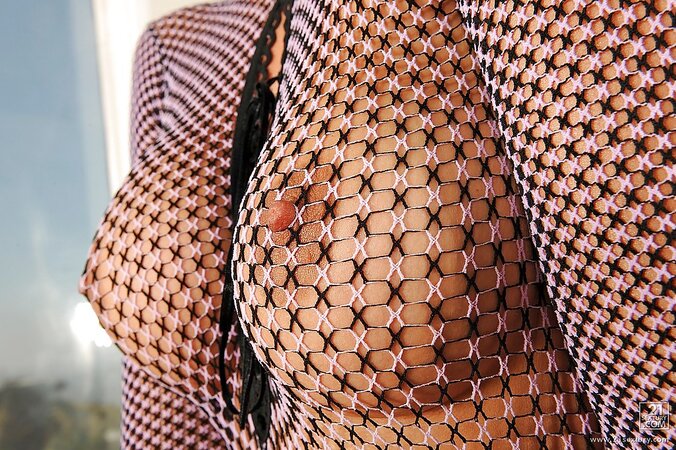 Hungarian blonde can masturbate butthole without taking off fishnet catsuit