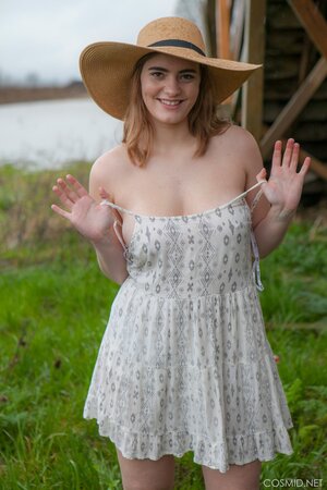 Hot country girl reveals her huge natural boobs and plump buttocks outdoors