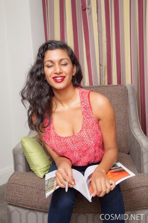 Alluring Indian beauty undresses and demonstrates her big breasts for the camera