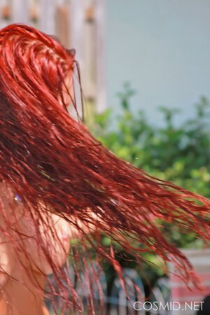 Unbearably-hot ginger bitch displays her firm tits and round butt outdoors
