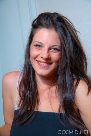Shy amateur babe strips to demonstrate her huge breasts for the first time