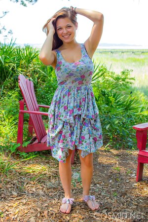 Sweet amateur belle pulls cute dress off and reveals her big breasts outdoors
