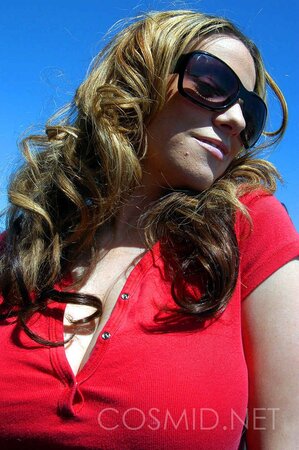 Busty whore in red top gets on the roof and teases with her big boobs