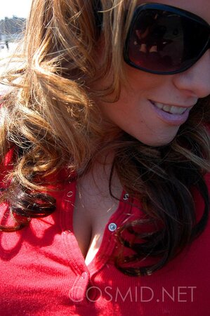 Busty whore in red top gets on the roof and teases with her big boobs