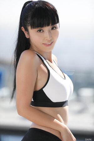 Petite Asian MILF strips off and teases with her fit naked body on the roof