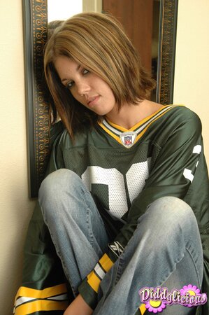 Football fan undresses and covers pussy using a piece of artificial cheese