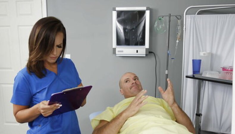 Wife doesn't know nurse behind curtain gives a blowjob to her husband