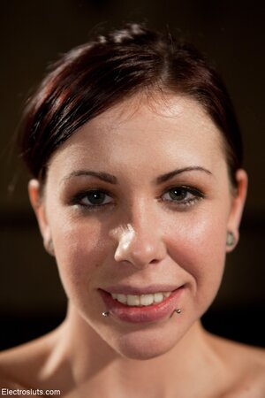 Naked inked slave-girl hangs from the ceiling and gets electrically tortured