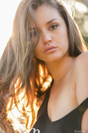 Erotic poolside session of ravishing brunette demonstrating her curves