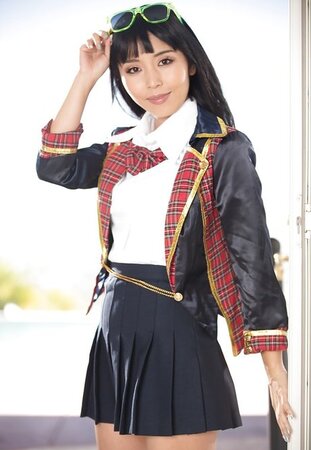 Sexy sweetie doffs sexy schoolgirl uniform to reveal her slim naked body