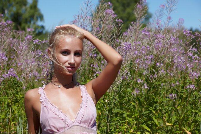 Angel-looking teen belle takes off cute dress and panties to show her nude curves