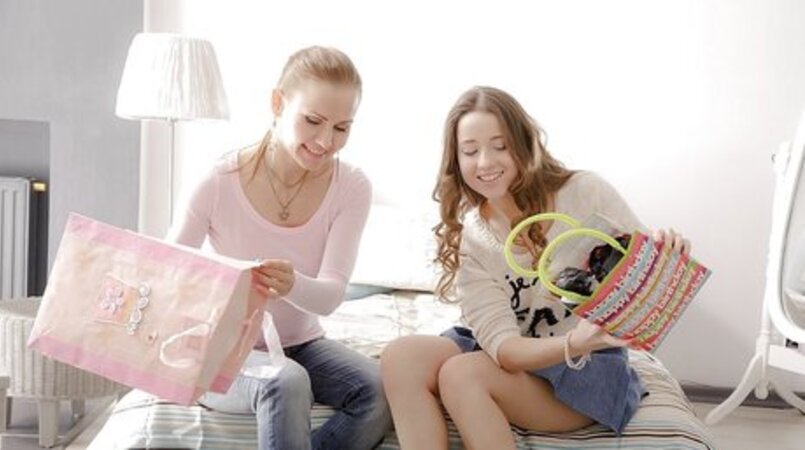 Amazing blonde girlfriends try on lingerie and get ready for lesbian session