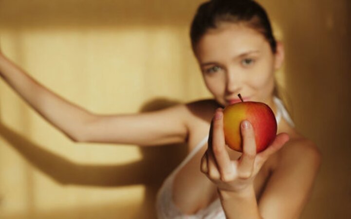 Young sweetheart enjoys eating fruit and reveals big boobs when stripping naked