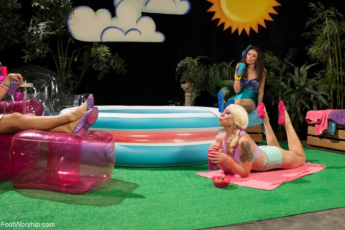 Three chicks with sexy feet tease by putting them in sticky sugar paste