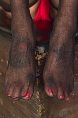 Asian and Ebony sluts take off black stockings and flaunt their cute feet