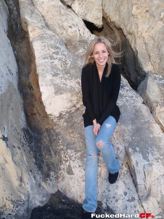 Cock-hungry blonde chick rubs pussy while filming herself in the mountains