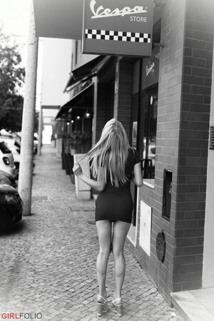 Fit blonde chick is not afraid to pose nude while doing everyday business